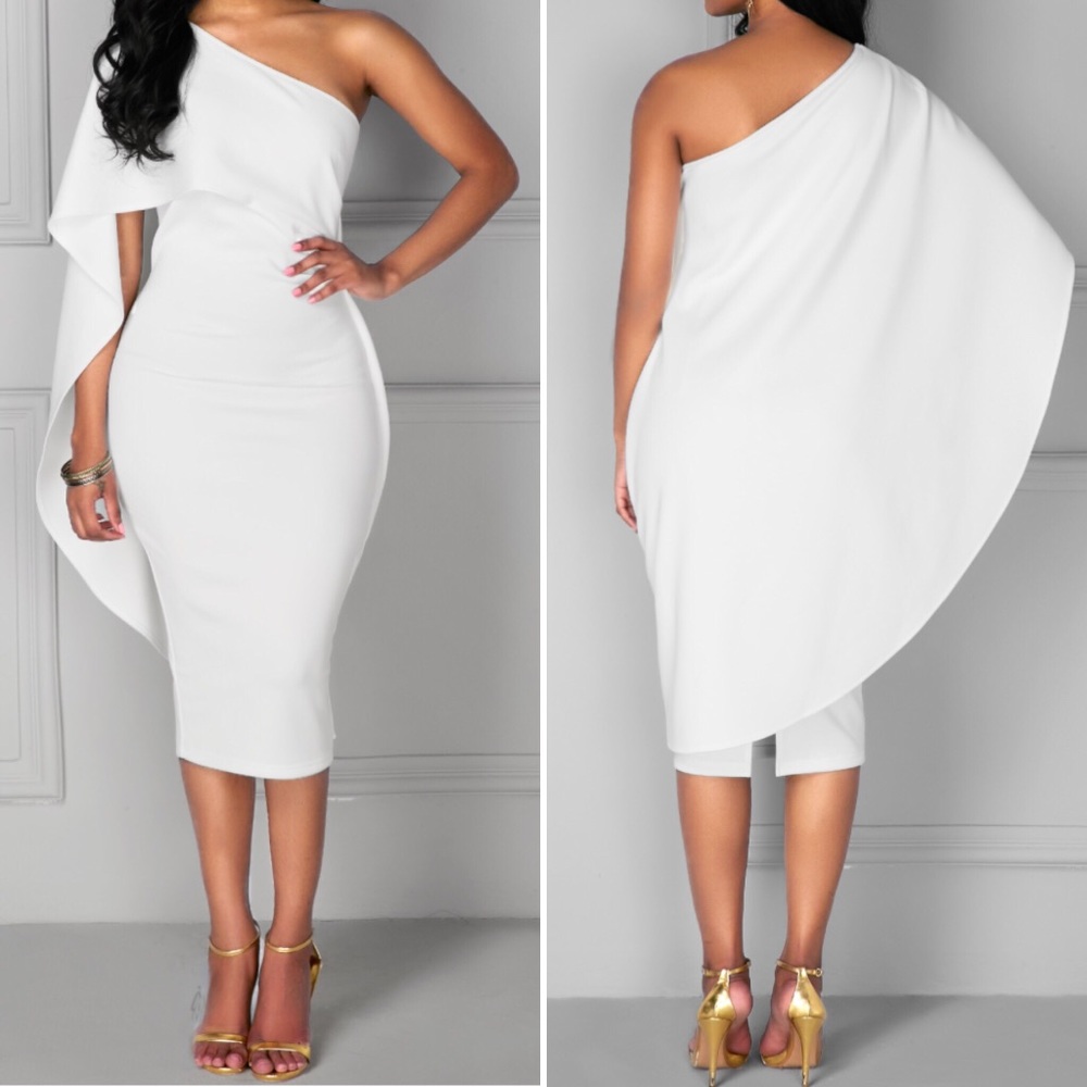 Form-fitting white dress with shoulder cape